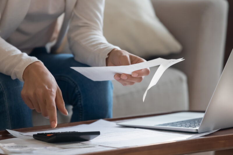 A person looking through paperwork.
