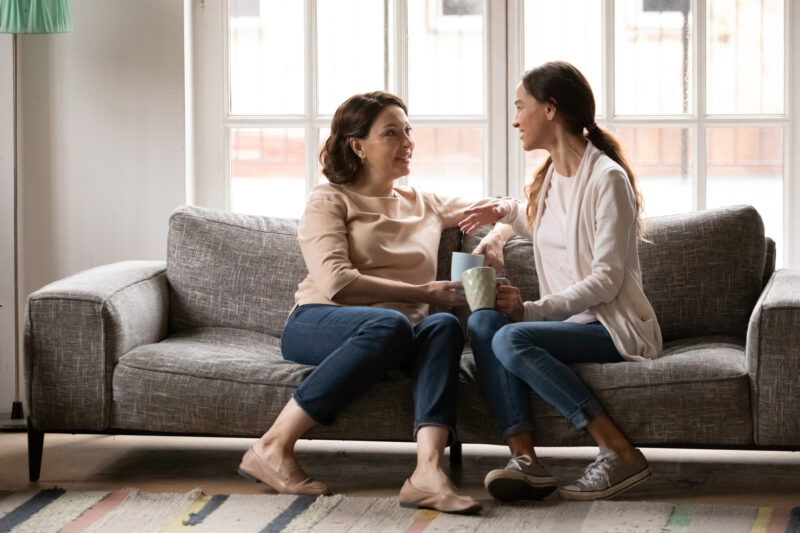 A mum talking to her adult daughter.